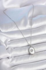 316L Çelik Gümüş Renk Beyaz Mineli Güneş İşlemeli Nazar Boncuk Detay Madalyon Model Kadın Kolye