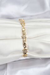 Pirinç Gold Renk VIP Seri Yıldız Model Zirkon Taşlı Kadın Bileklik