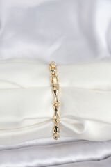 Pirinç Gold Renk VIP Seri Kemik Model Zirkon Taşlı Kadın Bileklik