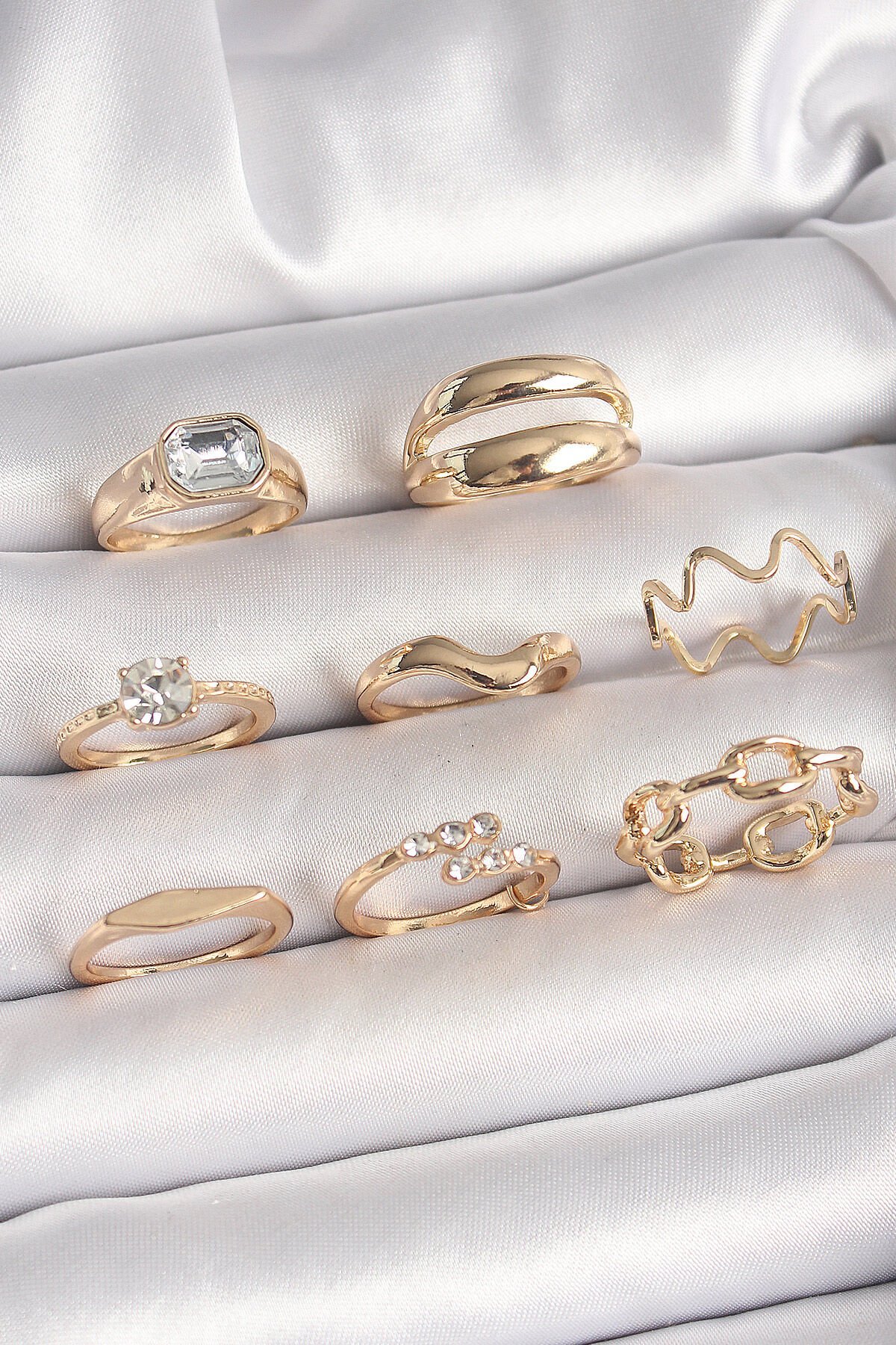 Pirinç Gold Renk Zirkon Taşlı Dalga Model Zincir Detay Kadın Yüzük Kombini