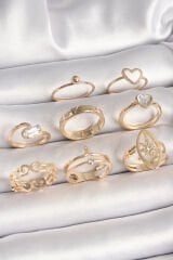 Pirinç Gold Renk Zirkon Taşlı Kalp Model Kutup Yıldız Detay Kadın Yüzük Kombini