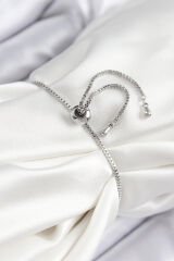 Pirinç Zirkon Taşlı Sıralı Ok Model Gümüş Renk Asansörlü Kadın Bileklik