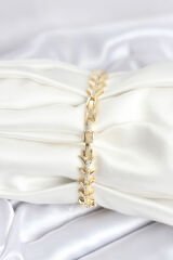 Pirinç Gold Renk Balık Sırtı Model Zirkon Taşlı Kadın Bileklik