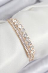 Pirinç Zirkon Taşlı Su Yolu Model Gold Renk Kadın Bileklik