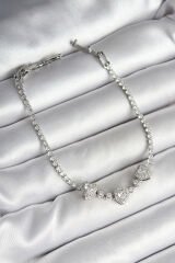 Pirinç Sıralı Kalp Figürlü Zirkon Taşlı Gümüş Renk Kadın Bileklik