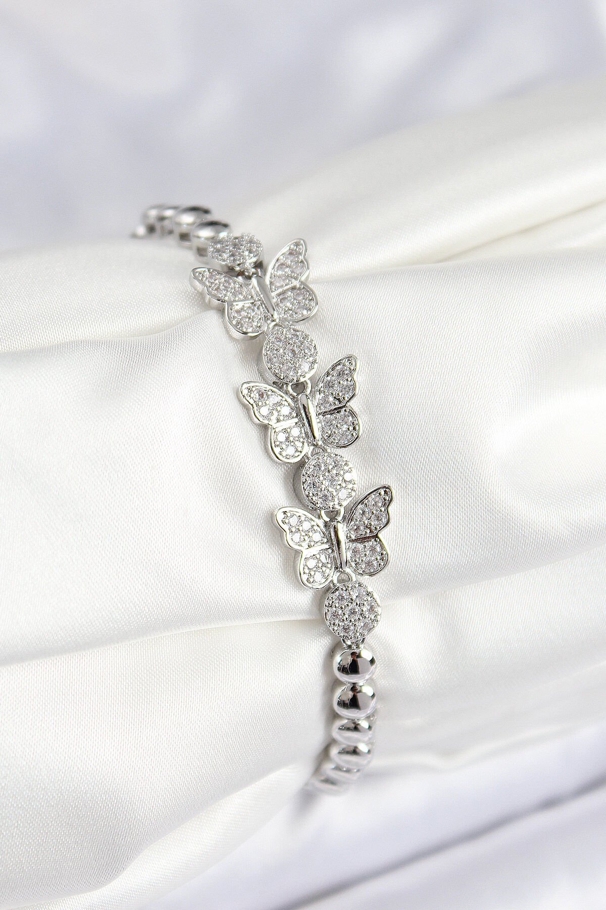 Pirinç Zirkon Taşlı Kelebek Model Gümüş Renk Kadın Bileklik