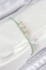 Pirinç Zirkon Taşlı Mavi Boncuklu Model Gold Renk Kadın Bileklik